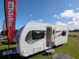 An Elddis flag by an Avante Apex 550