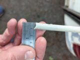 Using a ruler to show the Herzim trim is 12mm