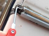 Removing the old trim with a Herzim tool