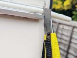 Trimming the end of the Herzim trim with a knife
