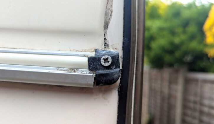One of the new stainless steel screws