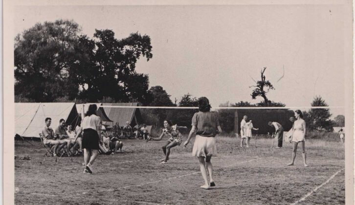 Club members playing quoits over a net, 1949