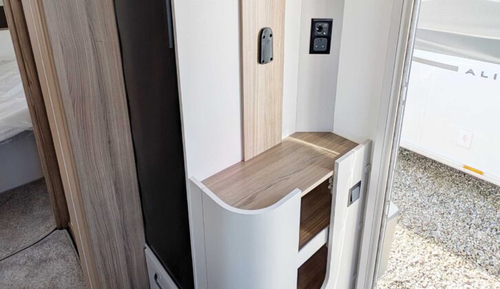 The space for the TV by the door