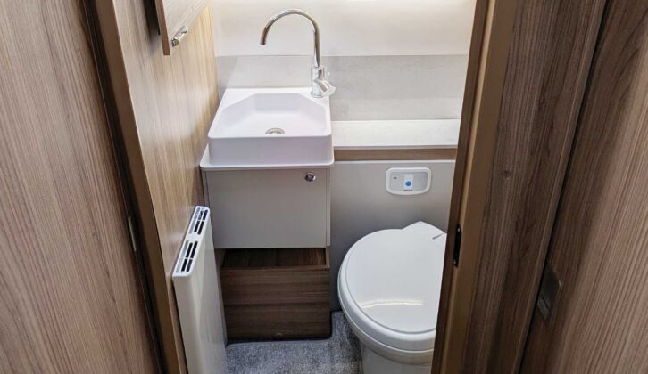 The washbasin and toilet in the washroom