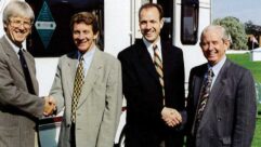 Roger Crafts (pictured second from the left) shaking hands