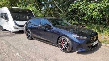 The BMW i5 M60 xDrive Touring hitched up to a caravan