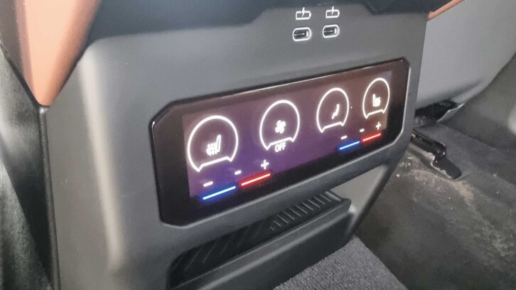 The seat controls for the back seats