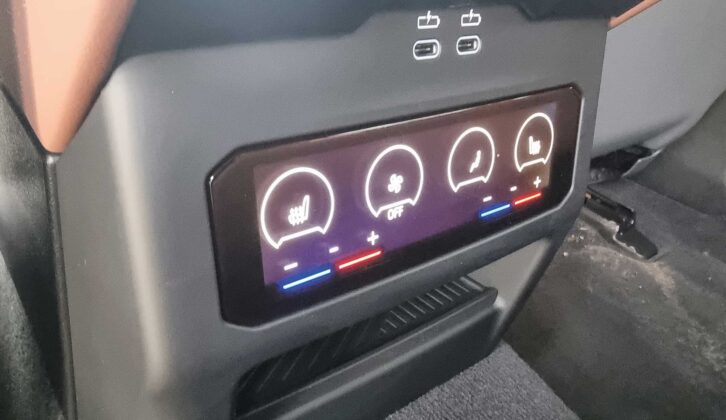 The seat controls for the back seats