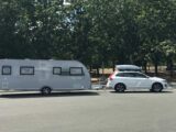 A car and caravan from the side