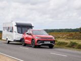 A tow car hitched up to a Coachman Laser 480 Xtra