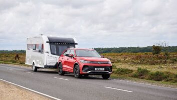 A tow car hitched up to a Coachman Laser 480 Xtra
