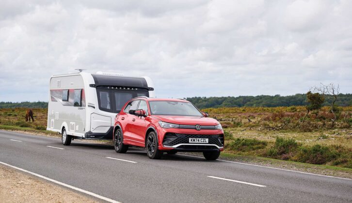 A tow car hitched up to a Coachman Laser 480 Xtra
