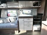 The settee next to the kitchen