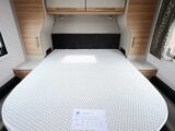 The island bed in the rear bedroom