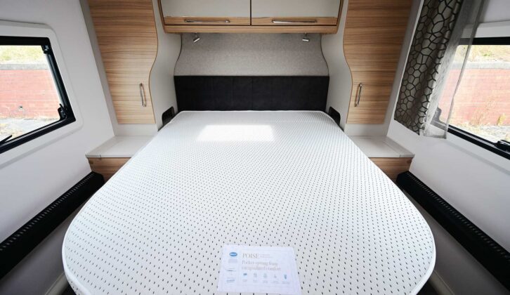 The island bed in the rear bedroom