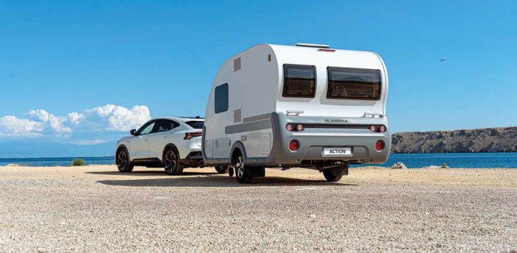 An Adria Action tourer being towed