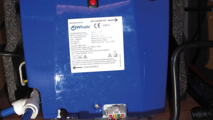 The red reset button on the centre of the panel