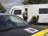 Police with the retrieved caravan