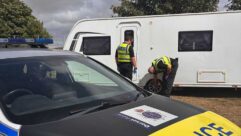 Police with the retrieved caravan