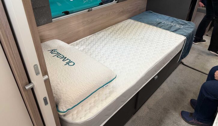 One of the fixed single beds in the Conqueror 565