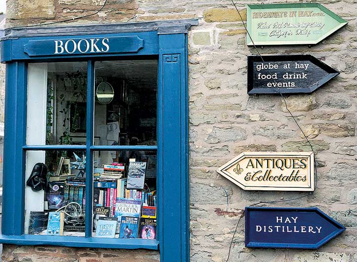 A bookshop and signs near Poston Mill
